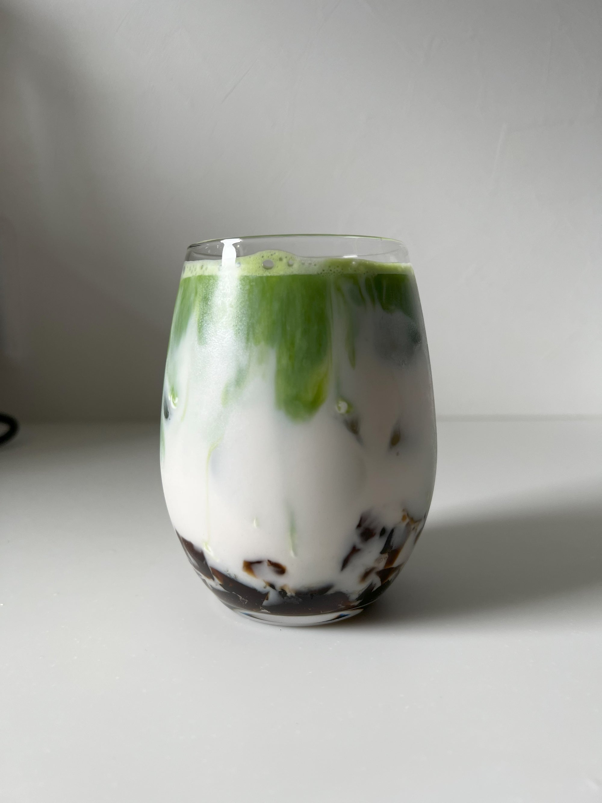 one of the best ways to drink matcha is in a matcha jelly latte